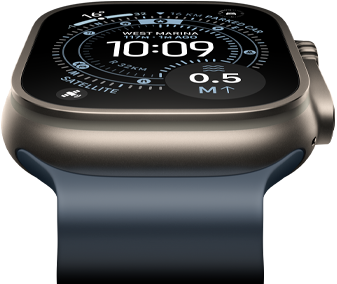 Apple Watch Ultra 3 tilted forward, natural titanium case, compass on Orienteering watch face, anchor blue Ocean Band